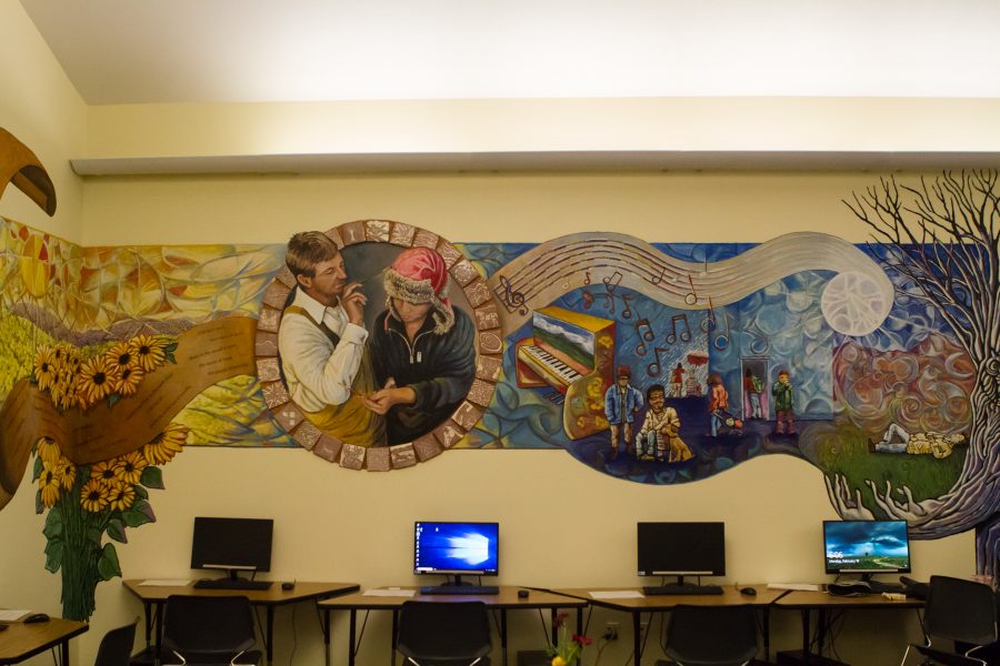 The mural painted on the wall at the Murphy Center is representative of the work they do as a resource center for homeless and those at risk of being homeless. They coordinate activities to help people in many different areas, from providing them with tools to find and hold steady employment to basic supplies for day to day life. (Josh Schroeder | Collegian)