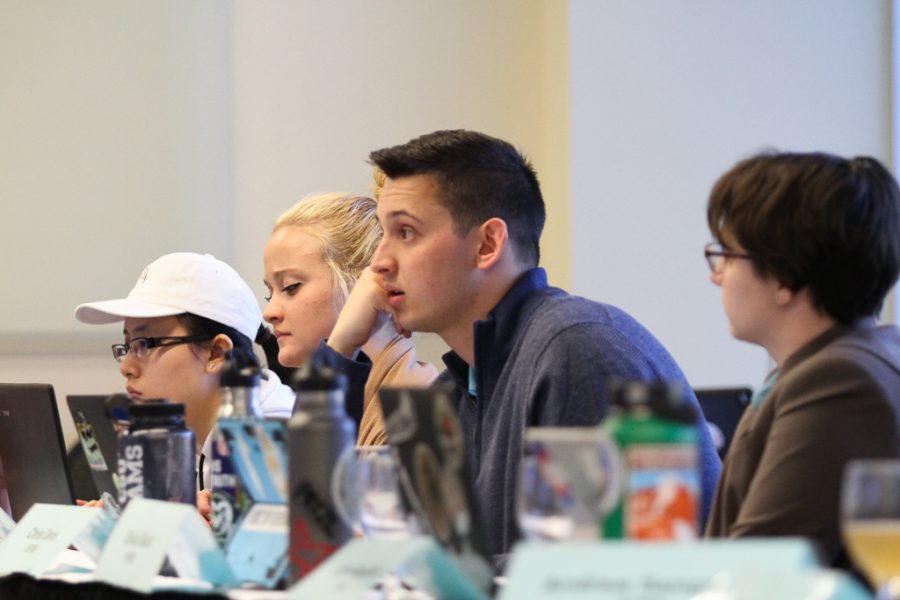 Members of the Student Fee Review Board wait while taking a roll call vote on the School of Music, Theatre and Dance proposal on Feb. 26. (Ashley Potts | Collegian)