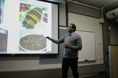 Mohammad Gorahki, a PhD student at CSU, speaks about his home country of Iran during International Night on Feb. 13. (Ashley Potts | Collegian)