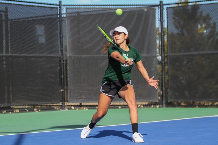 Sophomore Alyssa Grijalva hits against her opponent from Omaha during the Rams first home matches of the season on March 3. (Ashley Potts | Collegian)