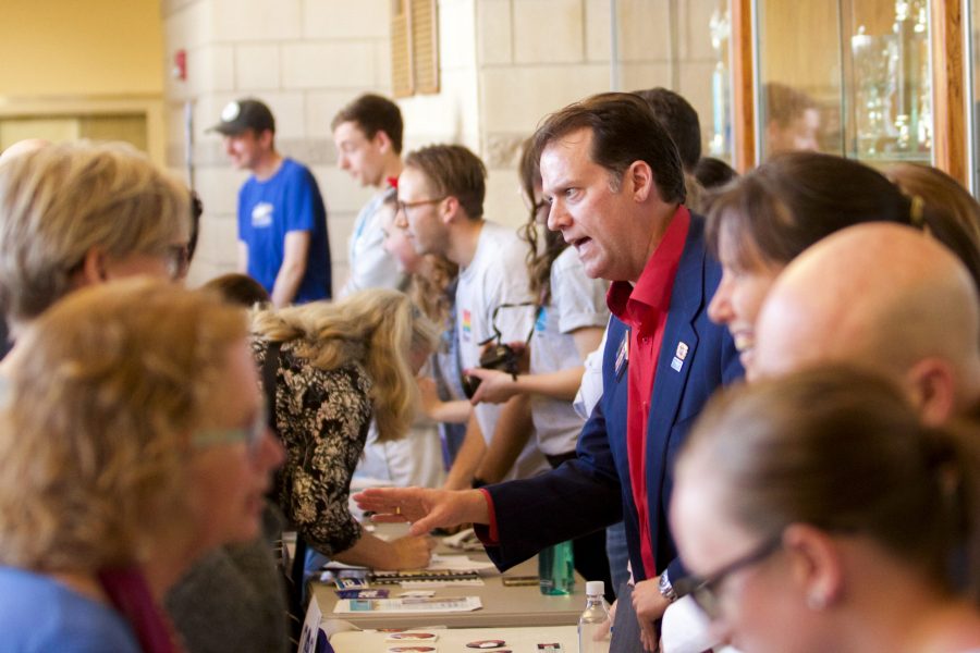 Candidate Stephen Barlock talks to Fort Collins residents after the Northern Colorado Gubernatorial Candidate Forum held this past Saturday. (Vinny Del Conte | Collegian)