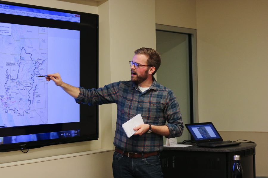 Luke Runyon points to the upper basin of the Colorado River while talking about snow melt. (Devin Cornelius | Collegian)