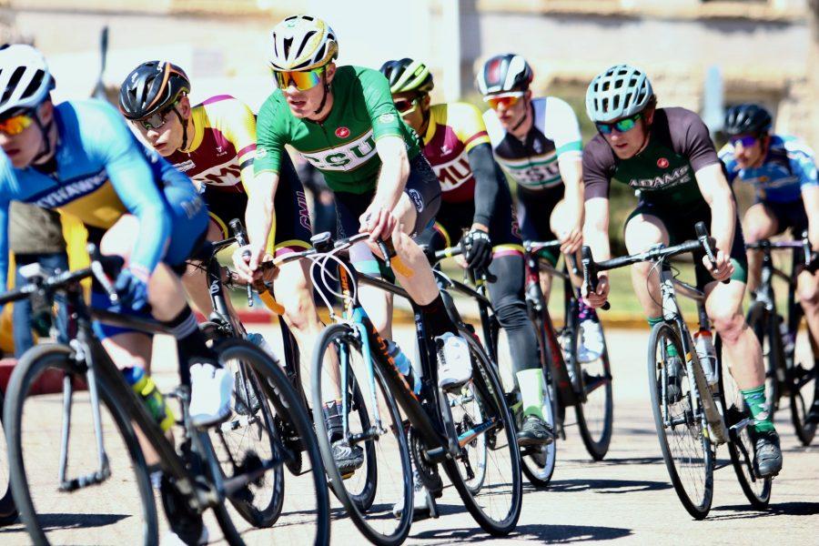 Members of the CSU cycling team race in the collegiate A race during the 32nd annual CSU Oval Criterium bike race on Sunday March 18th. (Matt Begeman | Collegian)