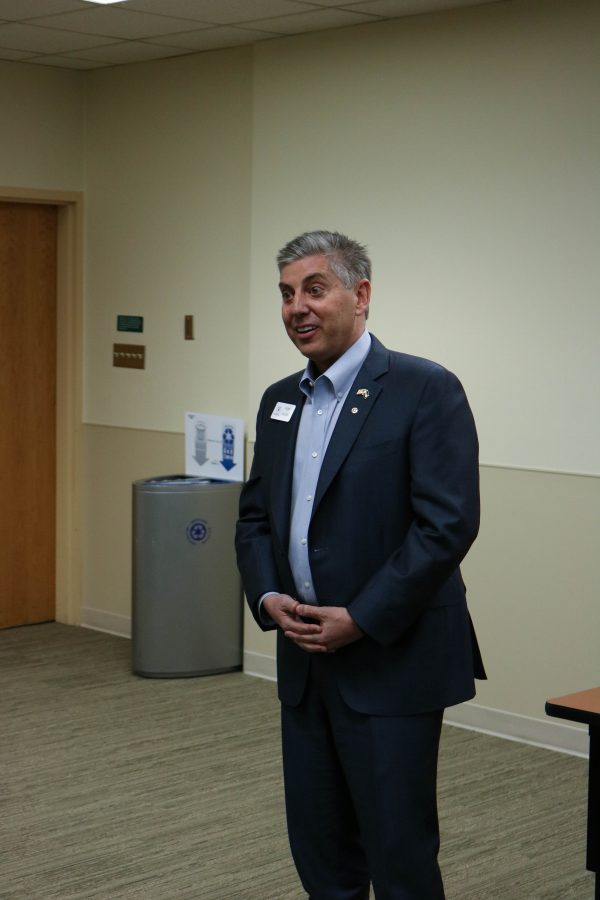 Victor Mitchell as he talks about some of the finer points of his platform (Collegian | Devin Cornelius)