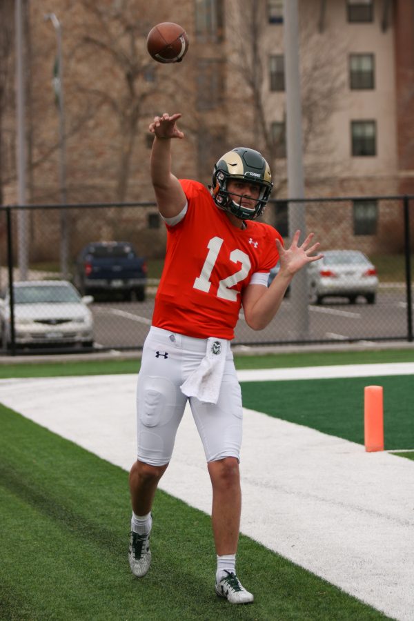 #12 Judd Erikson as he warms up during. practice (Collegian | Devin Cornelius)