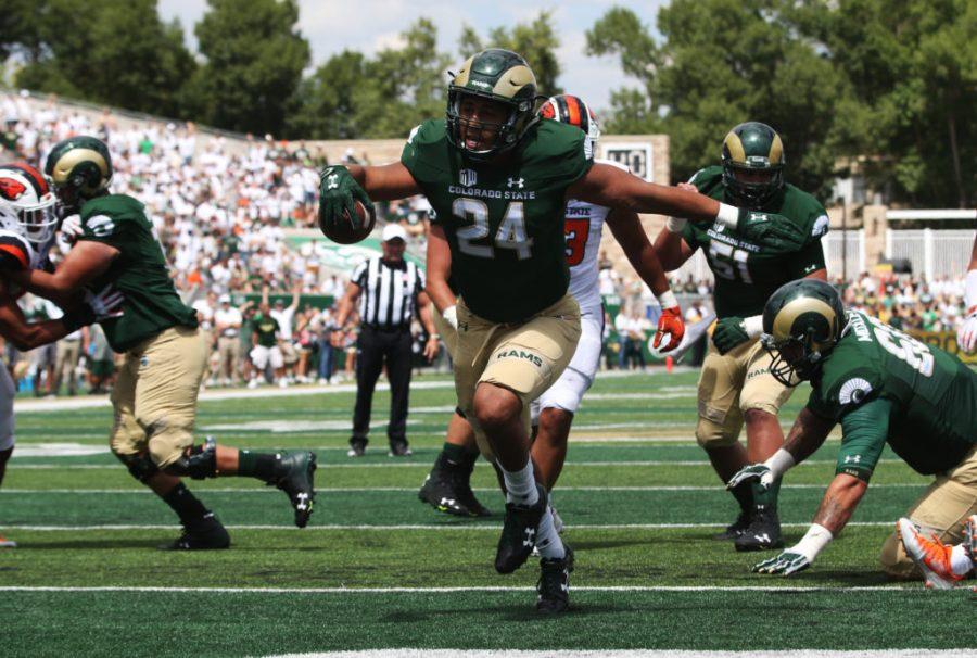 Colorado State running back Izzy Matthews scores CSU's first touchdown in the new on-campus stadium. The Rams defeated Oregon State 58-27. (Elliott Jerge | Collegian)
