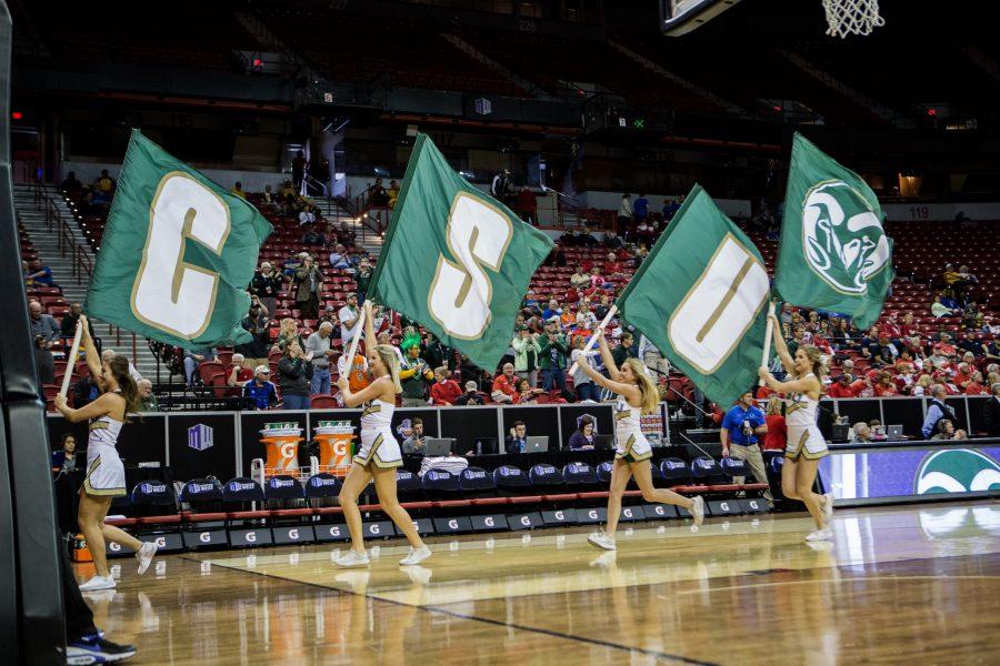 CSU Cheerleaders run out in front of the womens basketball team at the start of the Mountain West Conference game against Fresno St. on March 6, 2018. (Tony Villalobos May | Collegian)