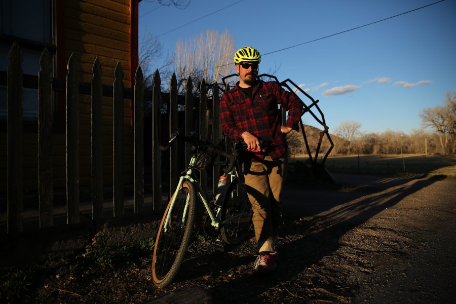 Robert Holland poses for a portrait while waiting for his friends prior to a road bike ride on March 20th in Bellvue. Holland and his friends planned a ride through Bellvue on Tuesday evening, and were hoping to take advantage of the warmer weather.  (Forrest Czarnecki | The Collegian)