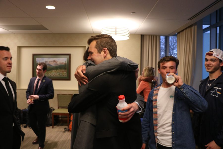 Syron and Sulivan hugging after discovering they won the election. (Devin Cornelius | Collegian)