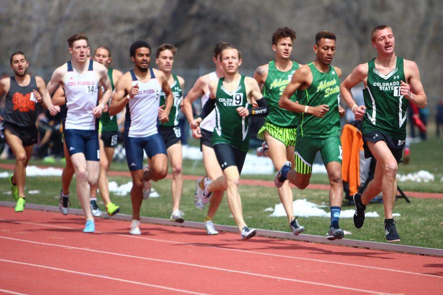 Distance runner Trent Powell (right) and Carson Hume (center) lead the fast heat of the 1500m race on Saturday April 7th at the CU Boulder Track Invitational. (Matt Begeman | Collegian)