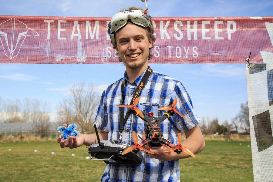 Chase Mallory, a physics major at CSU, stands with his quadcopters on the FoCo FPV drone racing track where he and other members can race their drones and compete for the fastest times around the circuit. (Davis Bonner | Collegian)