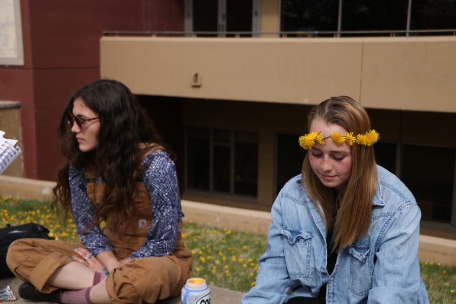 Quinn king, a freshman at CSU thinks about her favorite Coen Brothers movie after class on the plaza. (Devin Cornelius | Collegian)