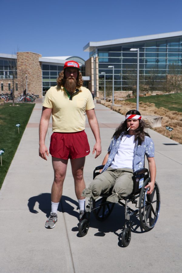 Forrest Gump (Reece Melton) and lieutenant Dan (Brett "Arnie" Arnusch 'smile' for the camera before running around campus. (Devin Cornelius | Collegian)