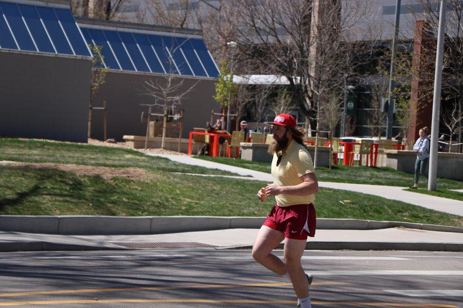 Forrest Gump (Reece Melton) as he keeps on running. (Devin Cornelius | Collegian)