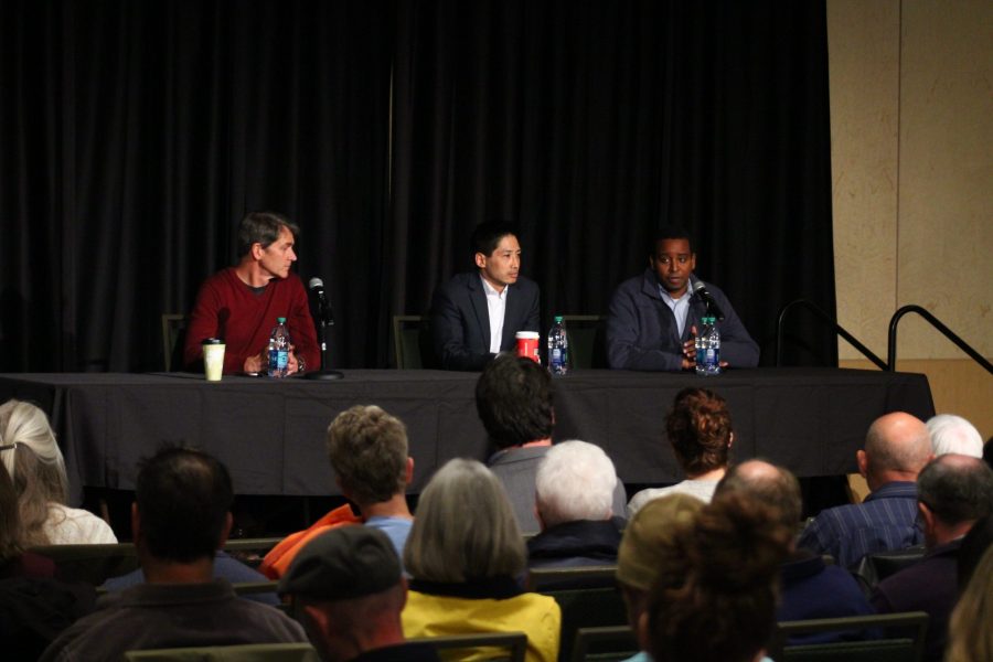 Candidates for Colorado's 2nd Congressional District, Democrat Mark Williams, left, Republican Peter Yu, center and Democrat Joe Neguse, right speak to a crowd of listeners during the primary elections in the LSC grand ballroom. (Matt Begeman | Collegian)