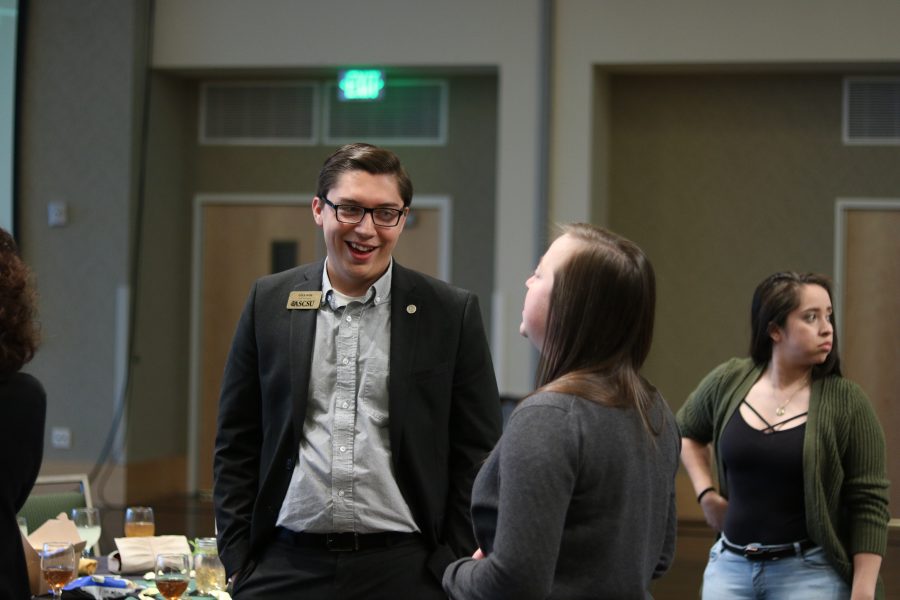 Students converse prior to the awards ceromony. (Devin Cornelius | Collegian)