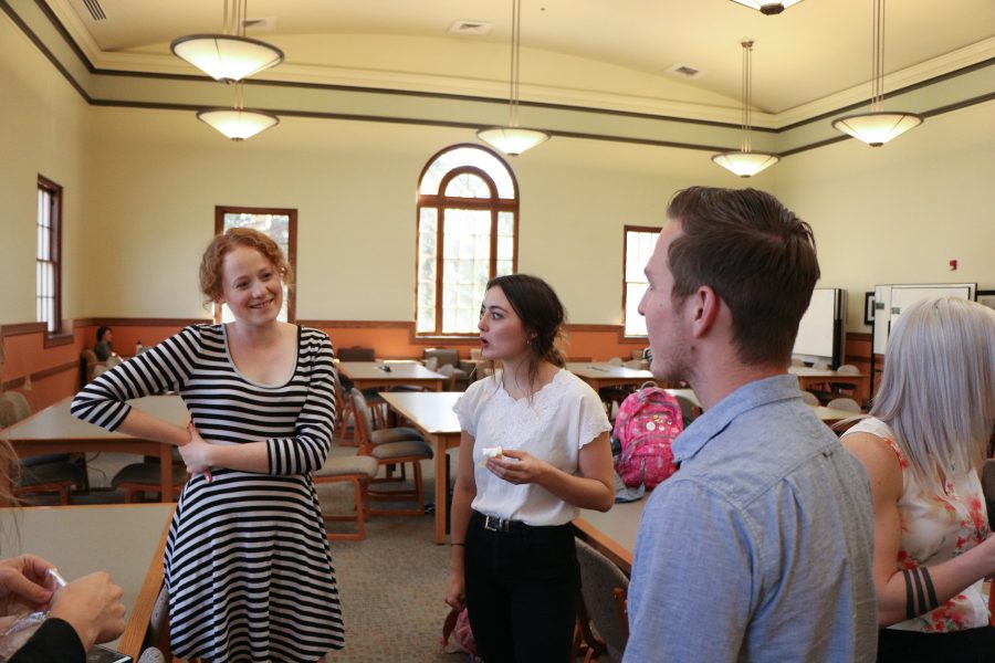 Haley Dallas and Allie Huber chat with Blake Jackson during the TILT awards Lunch.(Devin Cornelius | Collegian)