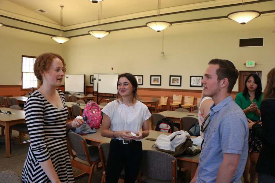 Haley Dallas and Allie Huber chat with Blake Jackson during the TILT awards Lunch.(Devin Cornelius | Collegian)