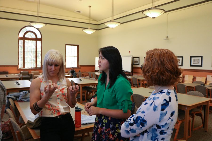 Destiny Burnsworth, Hannah Hurlbut, and Ashley VanDyke all chat about their scholarships during the TILT awards. (Devin Cornelius | Collegian)