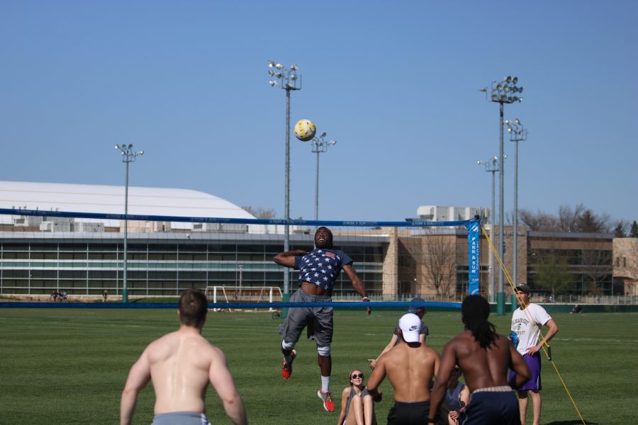 A student jumps for a spike during the RAMslam volleyball tournament. (Devin Cornelius | Collegian)