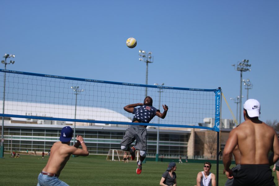 A student jumps for a spike during the RAMslam volleyball tournament. (Devin Cornelius | Collegian)