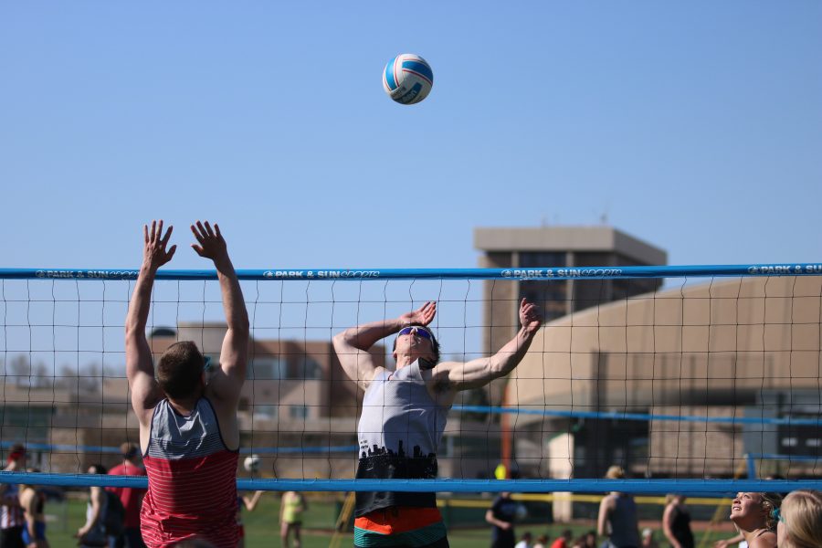 A student prepares to spike the ball down during the RAMslam volleyball tournament. (Devin Cornelius | Collegian)
