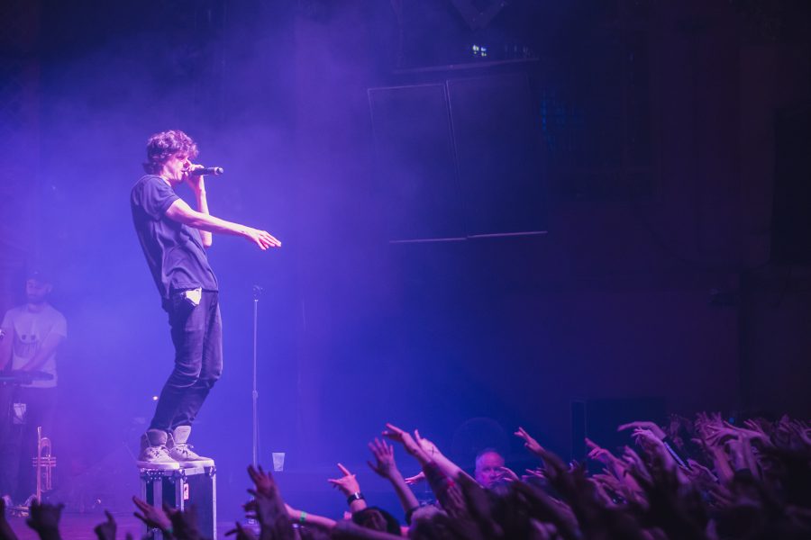 Slam poet turned professional rapper Watsky performs for a packed house Saturday night at the Ogden theater in downtown Denver as part of his Low Visibility Tour featuring the band Invisible Inc. (Davis Bonner | Collegian)