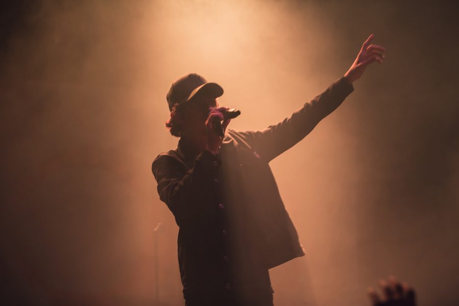Slam poet turned professional rapper Watsky performs for a packed house Saturday night at the Ogden theater in downtown Denver as part of his Low Visibility Tour featuring the band Invisible Inc. (Davis Bonner | Collegian)