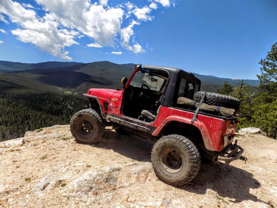 Drayton Browning, a CSU Engineering student, goes off-roading in his custom built Jeep just west of Fort Collins, CO. (Photo by Drayton Browning) 