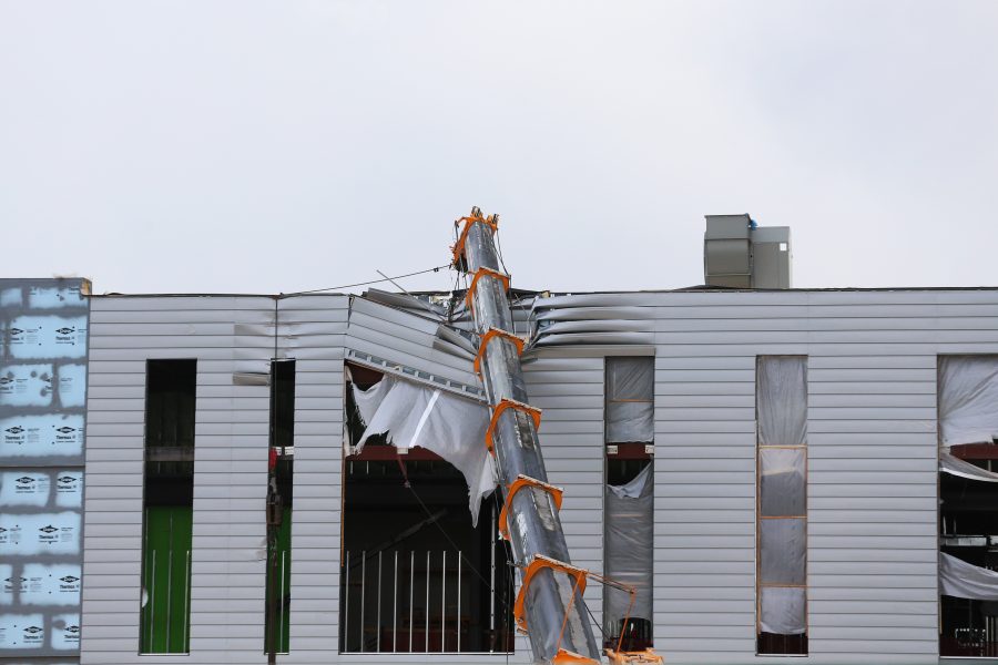 A crane tips over onto the new C. Wayne McIlwraith Translational Medicine Institute Building on Colorado State Universitys Campus on Monday April 23. (Elliott Jerge | Collegian)