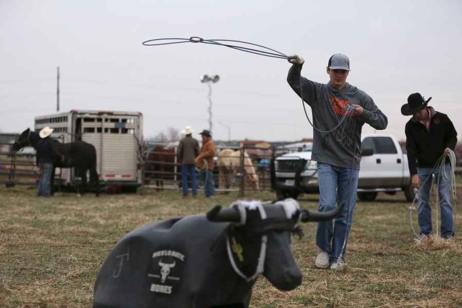 Riley Ruland practices his roping skills before the 68th annual Skyline Stampede rodeo on April 7, 2018 at the B.W. Pickett Arena in Fort Collins.  (Forrest Czarnecki | The Collegian)