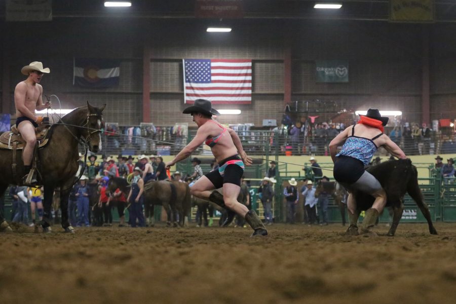 Rodeo athletes compete in the costume ribbon roping event at the 68th annual Skyline Stampede rodeo on April 7, 2018 at the B.W. Pickett Arena in Fort Collins.  (Forrest Czarnecki | The Collegian)