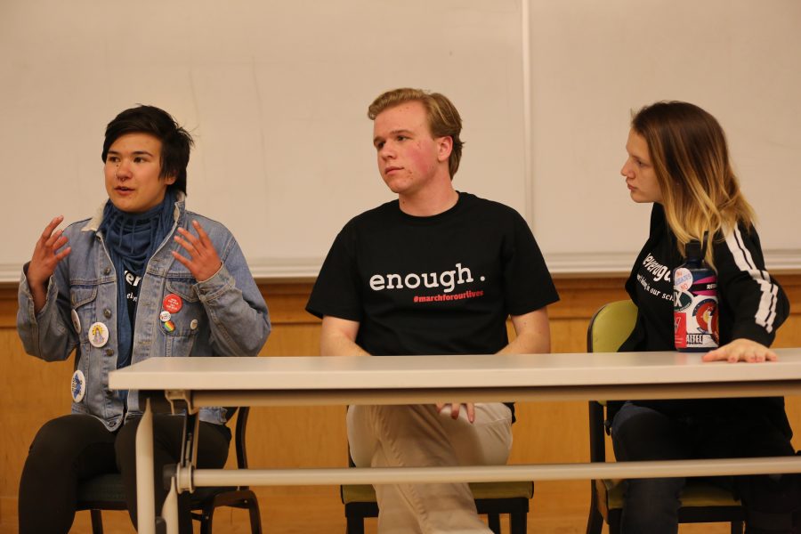 Allie Holton, Wout Boukaert and Haley Ratcliff hold a discussion about mental health and gun violence at the Columbine Shooting Memorial Rally and Vigil in the Clark A building on April 20, 2018.  (Forrest Czarnecki | The Collegian)