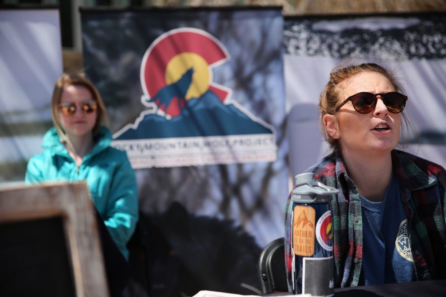 Amy Nelson, with the Rocky Mountain Wolf Project, talks about the logistics of reintroducing wolves into the state of Colorado during Earth Week on the plaza on April 25, 2018.  (Forrest Czarnecki | The Collegian)