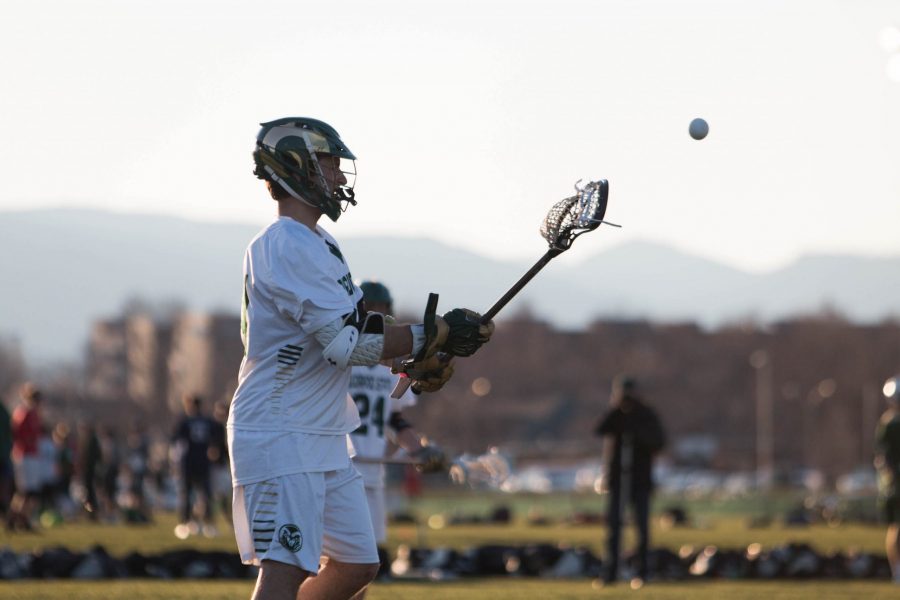 Senior AJ Stewart throws the ball during the second quarter. CSU lost to Cal Poly with a score of 9-7.  (Julia Bailey | Collegian)