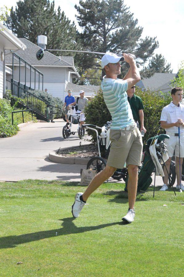 Senior Max Oelfke holds a follow through during a practice round at Fort Collins Country Club. (AJ Frankson | Collegian)