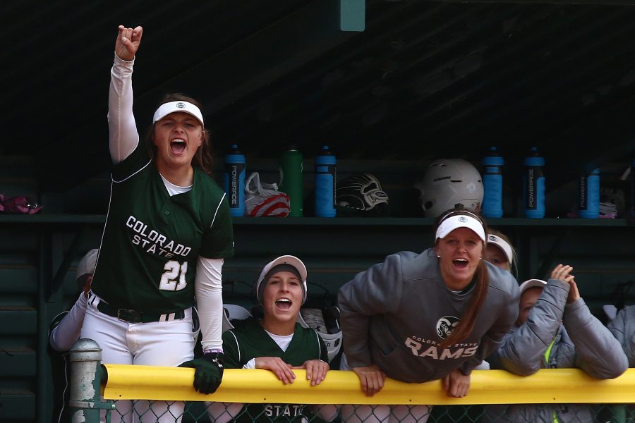 The Colorado State dugout cheers on a teammate after she gets onto first against UNLV at Rams Field on Friday April 21, 2017. (Elliott Jerge | Collegian)