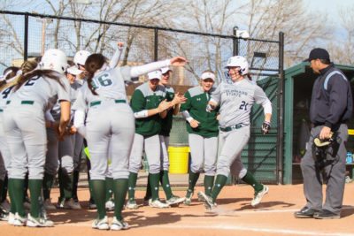 Junior Lauren Buchanan hits a home run during the game against Utah Valley on March 9. The Rams beat the Wolverines 5-3. (Ashley Potts | Collegian)