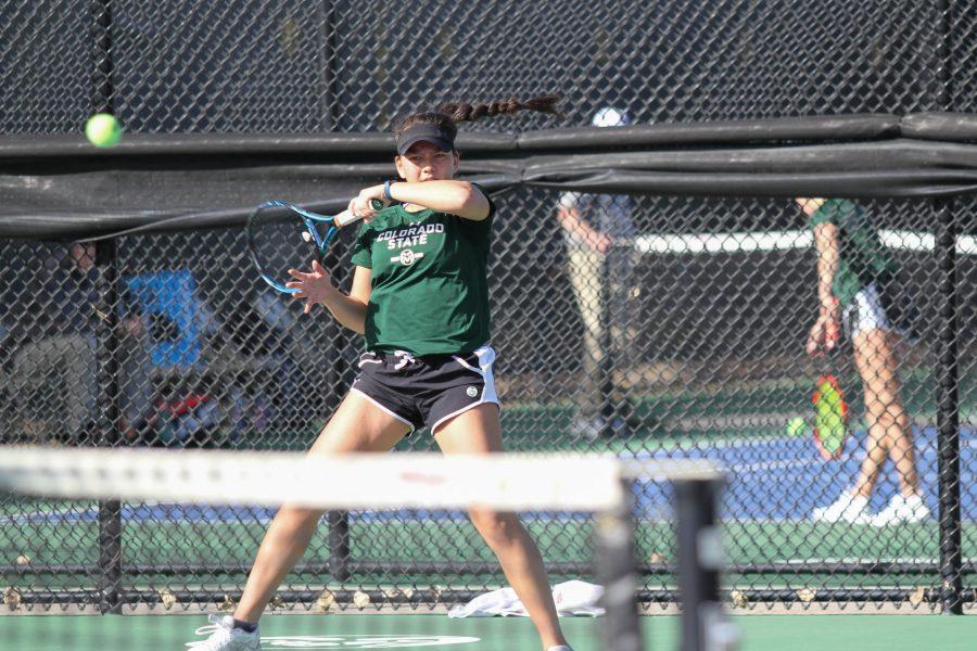 Freshman Priscilla Palermo hits against her oppenent from Omaha during the Rams first home matches of the season on March 3. (Ashley Potts | Collegian)