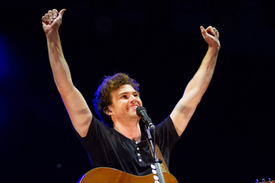 Vance Joy puts his hands in the air while thanking the crowd at his Red Rocks show on May 30 The show was part of his Nation of Two headlining tour. (Ashley Potts | Collegian)