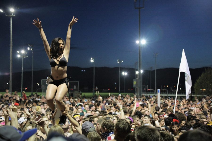 Thousands of CSU students gather in the volleyball courts outside the Rec Center on campus to celebrate the annual Undie Run before finals week. (Davis Bonner | Collegian)