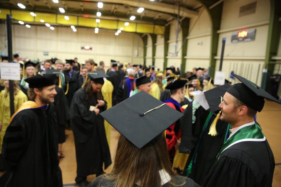 Colorado State University graduates gather in the auxiliary gym before the graduation ceremony for the College of Agricultural Sciences on May 12, 2018 at Moby Arena.  (Forrest Czarnecki | The Collegian)