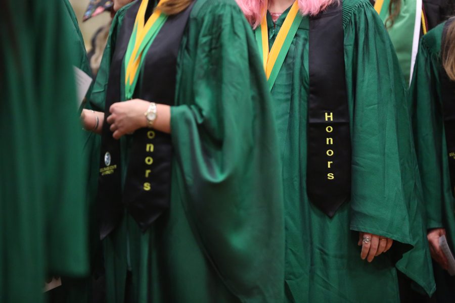 Colorado State University graduates line up for the precession into Moby Arena before their graduation ceremony begins. CSU held the graduation ceremony for the College of Agricultural Sciences on May 12, 2018 at Moby Arena.  (Forrest Czarnecki | The Collegian)