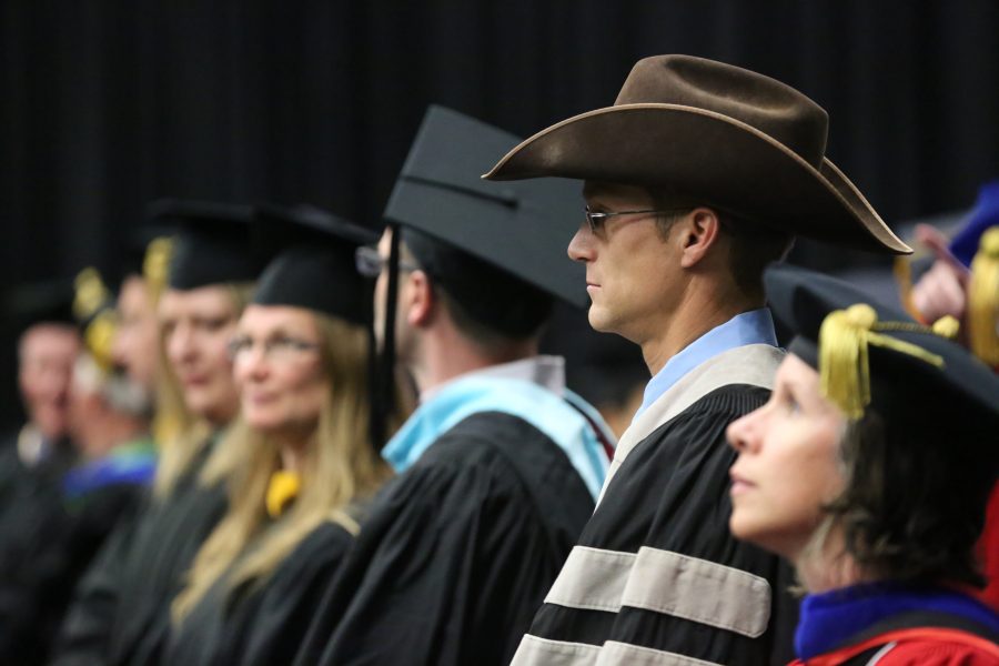 Colorado State University professor of equine sciences John Snyder wears a cowboy hat before the graduation ceremony for the College of Agricultural Sciences begins on May 12, 2018.  (Forrest Czarnecki | The Collegian)