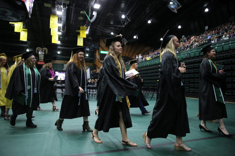 Colorado State University graduates leave Moby Arena after the graduation ceremony for the College of Agricultural Sciences on May 12, 2018.  (Forrest Czarnecki | The Collegian)