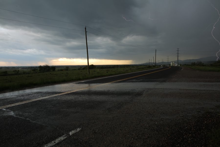 Lightning strikes west of town after a large thunderstorm passed through Fort Collins on May 22, 2018. The storm brought heavy rain, hail and lots of lightning.  (Forrest Czarnecki | The Collegian)