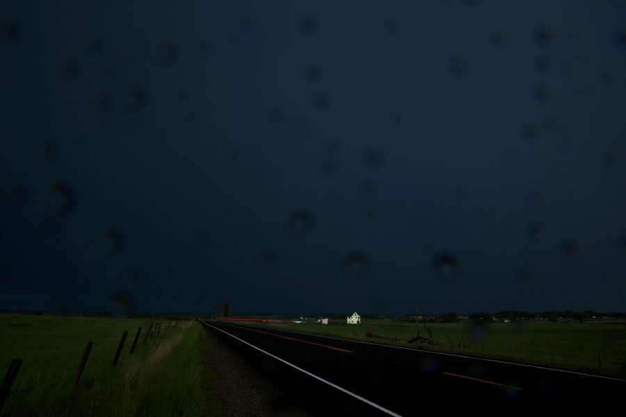 A large thunderstorm is seen through the water droplets on the camera lens as it passes over Fort Collins on May 22, 2018. The storm brought heavy rain, hail and lots of lightning.  (Forrest Czarnecki | The Collegian)