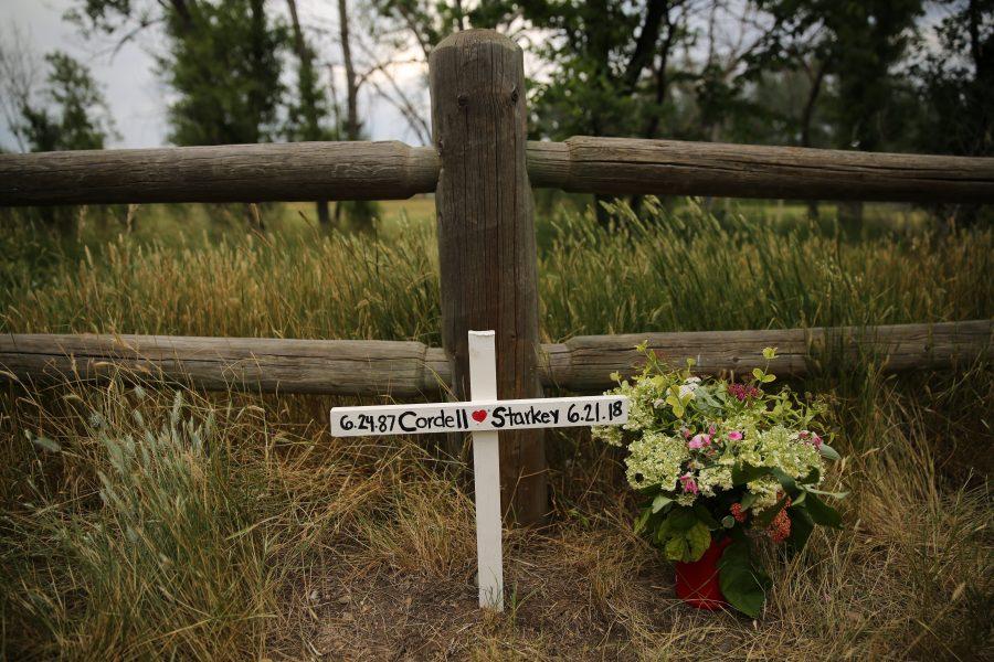 A memorial set up by Cordell Starkey's neighbors and friends is pictured along the fence at Legacy Park in Fort Collins. Fort Collins police found the body of Starkey in the river on June 24th after he was reported missing days earlier.  (Forrest Czarnecki | The Collegian)