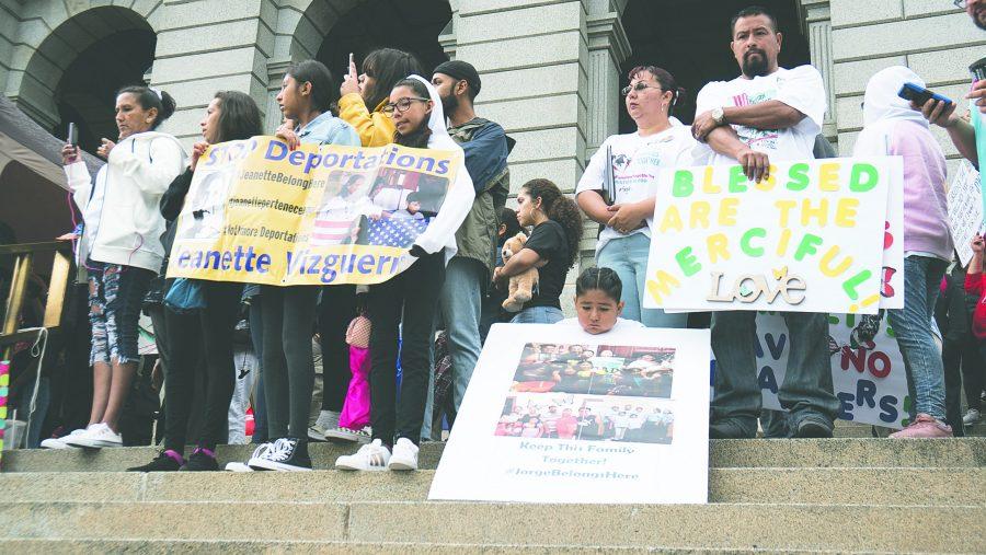 Jeannette Vizguernia and supporters along wih the family of Jorge Rafael Zaldivar Mendieta gather on the Denver Captitol building steps during the Save our Children Now March on sunday, June 24. (Jayla Hodge | Collegian)