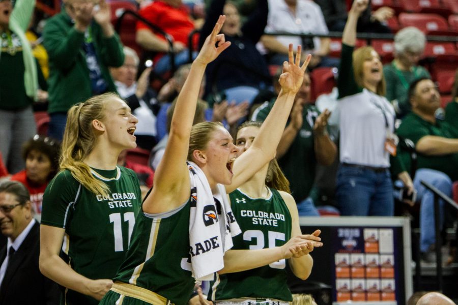 Lena Svanholm (11), Annie Brady (32) and Lore Devos (35) cheer on their teammates after a 3-pointer against Fresno State in Las Vegas on March. 6. The Rams defeated the Bulldogs 71-55 in the Mountain West Tournament. (Tony Villalobos May | Collegian)